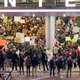Protestors demonstrate against Trump’s Muslim ban at LAX on Jan. 28, 2017. Image via AP Photo.
